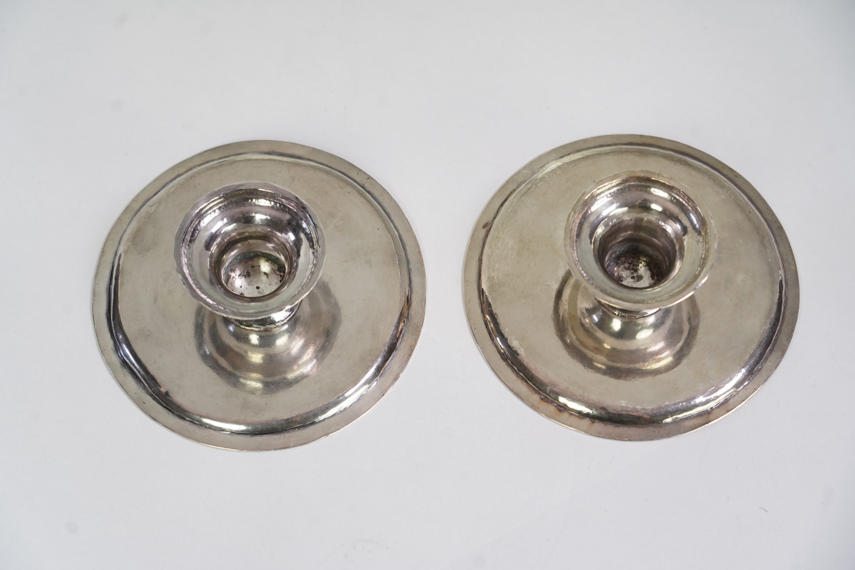 A pair of early late George I/early George II provincial silver patens, by John Elston Jnr